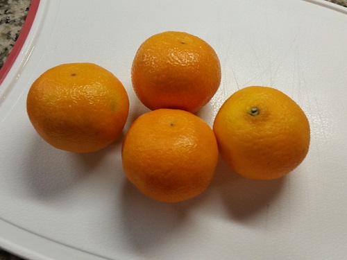 four mandarin oranges