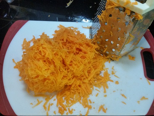 shred carrots with a grater