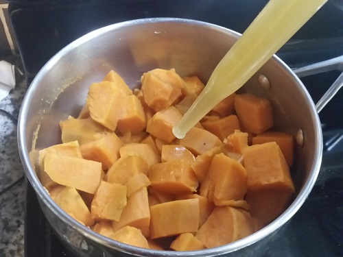 cooked sweet potatoes with turkey pan drippings