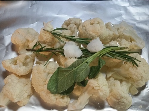 add sage and rosemary to cauliflower